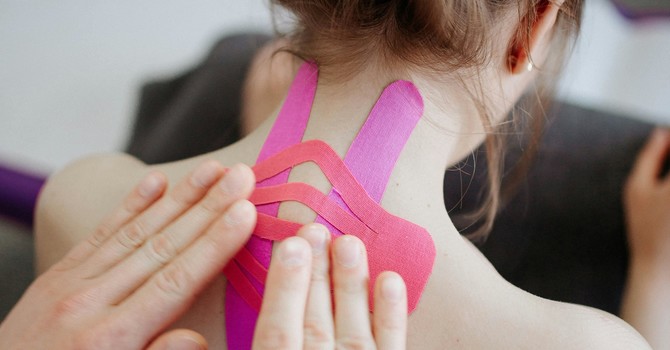 Kinesio Taping + Massage Therapy